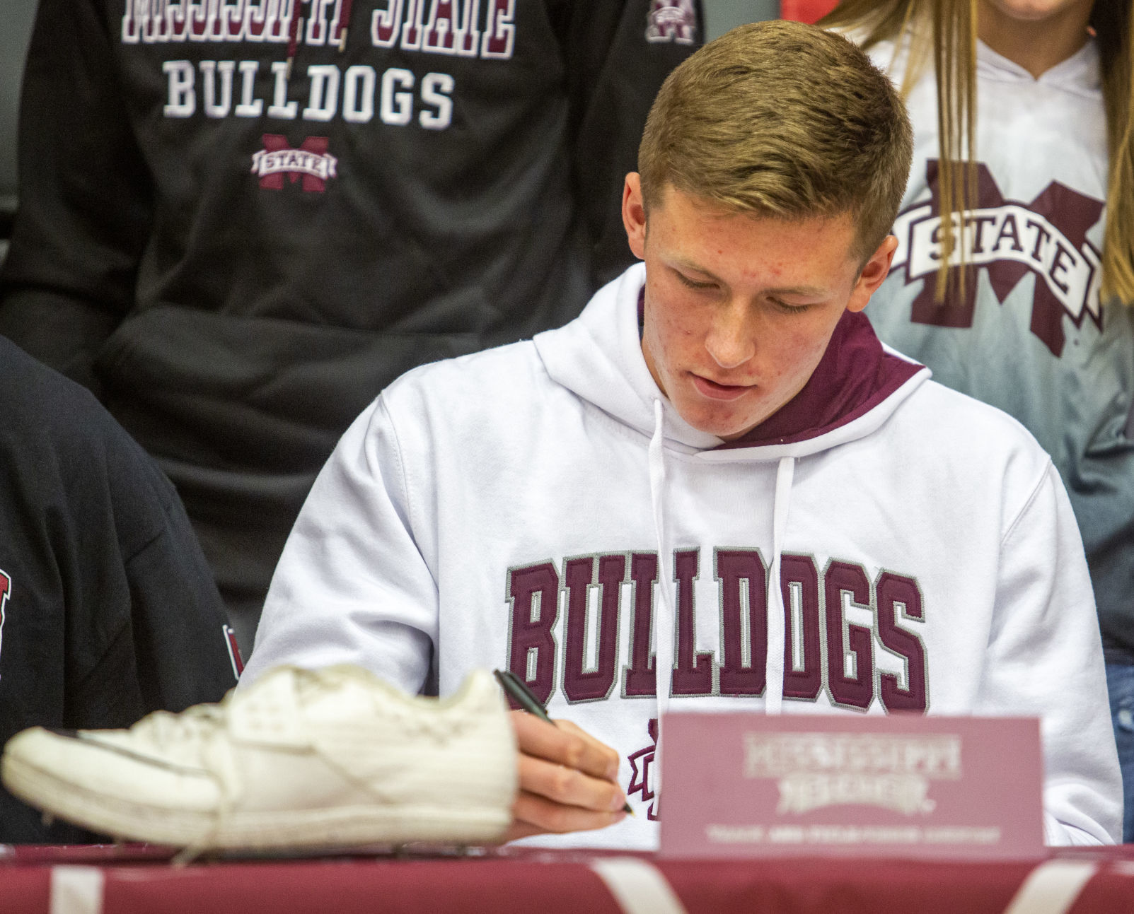 Four Kimberly students sign college letters of intent